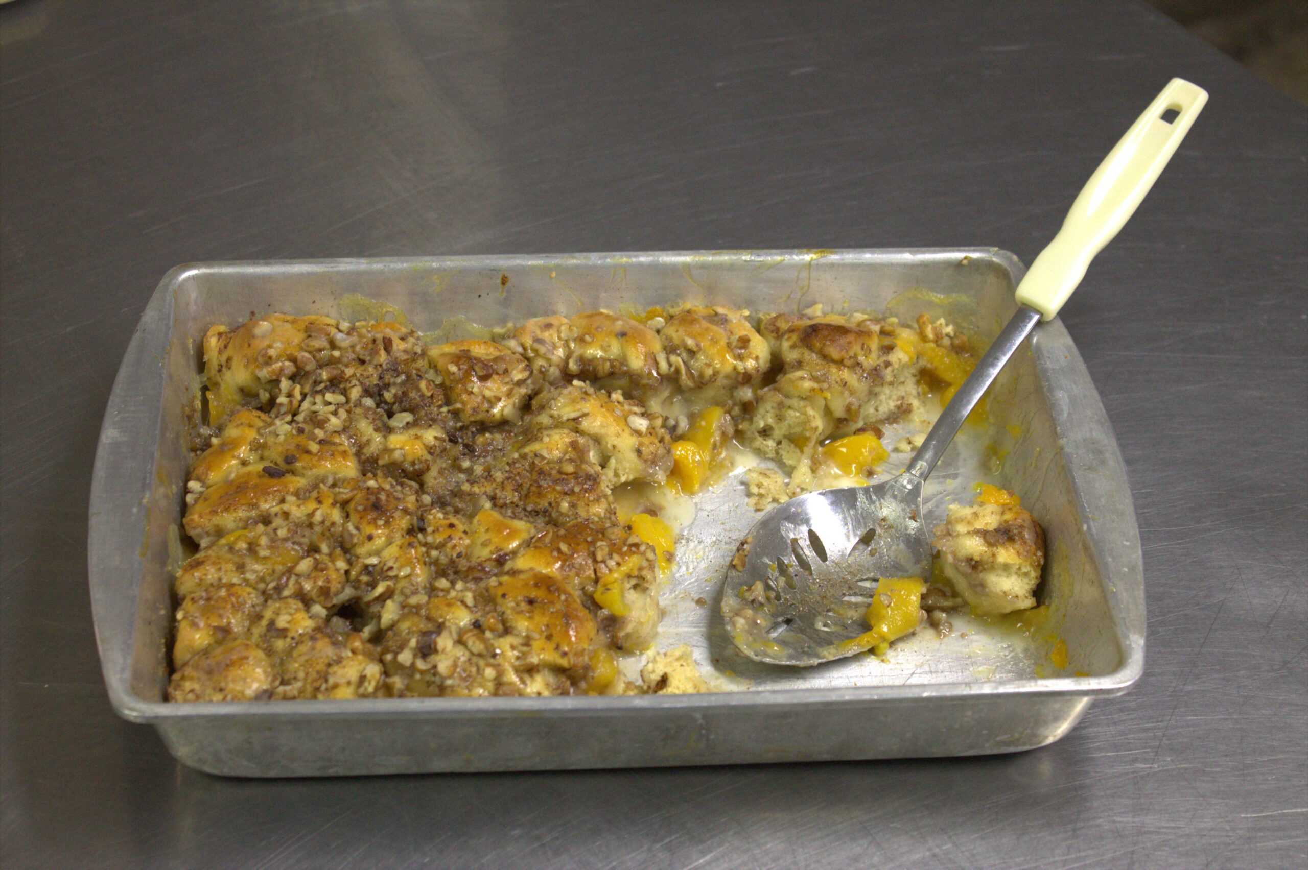 A metal pan with food on top of it.